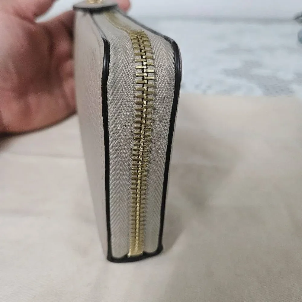 Louis Vuitton Taurillon portefeuille Comete long zip wallet